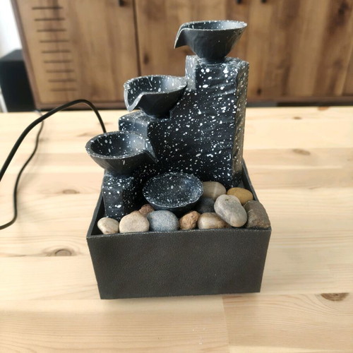 Mini fountain used, battery and electric powered