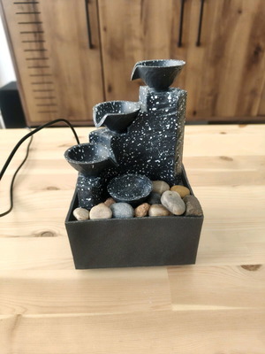 Mini fountain used, battery and electric powered