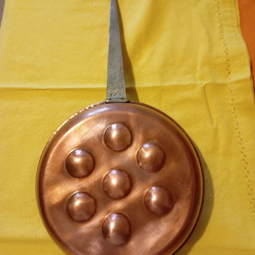 Vintage copper egg pan with 7 slots used