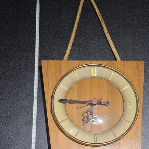 Mid-Century Modern wall clock like new with rope and wood