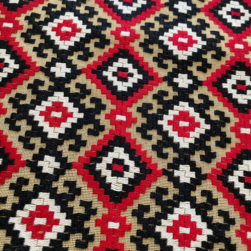 Set of 2 handmade woven decorative textiles with geometric pattern