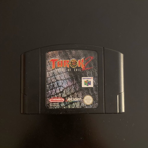 Nintendo 64 used with two controllers and Turok 2 Seeds of Evil game
