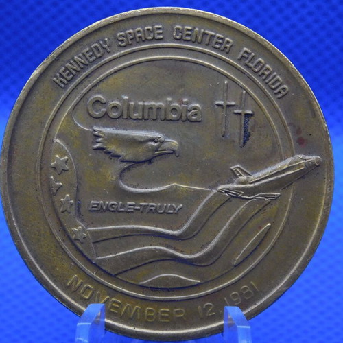 Commemorative metal token with space shuttle, USA