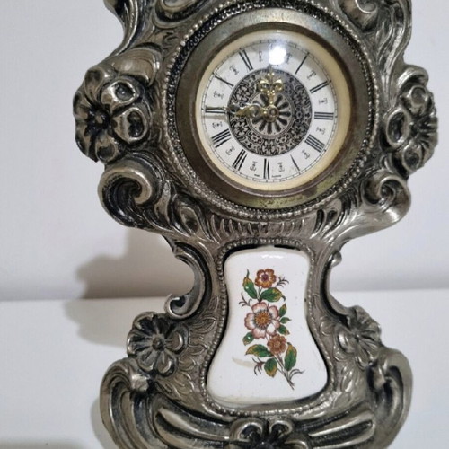 Antique clock used with German mechanism and porcelain decoration