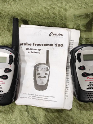Pair of Freekomm 200 wireless walkie talkies like new, German made