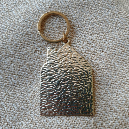 Keychain charm "mati" like new, metal with blue eyes