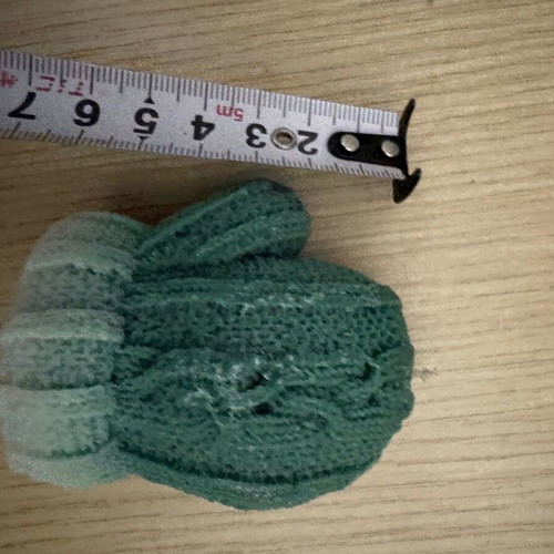 Green candle in glove shape new