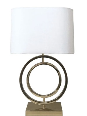 Table lamp with golden steel base and white fabric shade like new