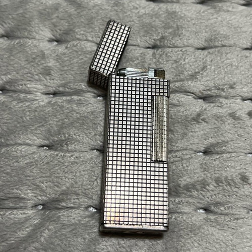 Silver lighter used with gas