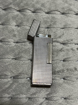 Silver lighter used with gas