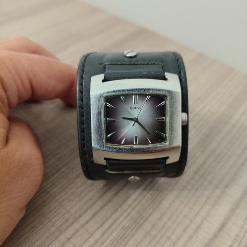 Guess I65186G1 watch with stainless steel and leather strap, used