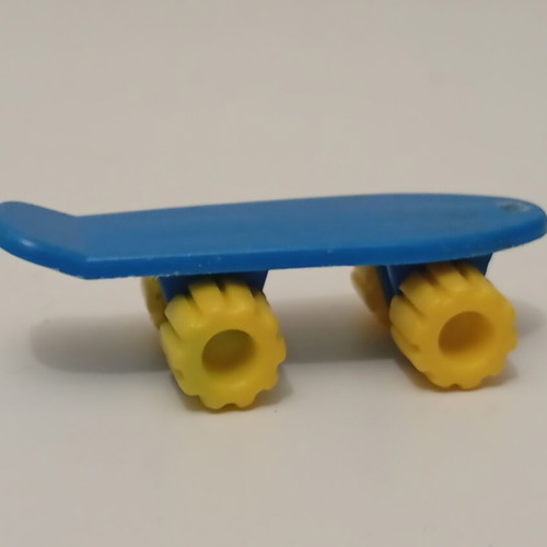 Vintage Algida Lucky Cup blue skateboard toy from the 1980s