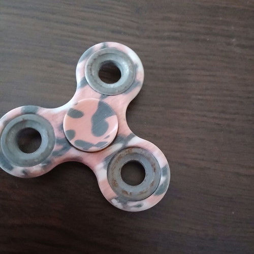 Fidget spinner with red tiger design, like new