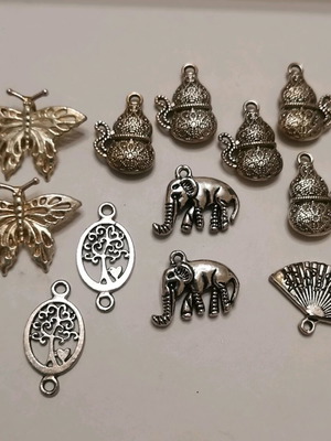 Medium size silver charms, 12 pcs, like new for jewelry making
