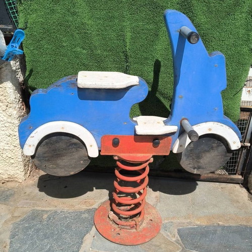 Rocking Ground Toy Motorcycle with Spring and Iron Base used, outdoor