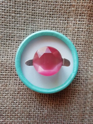 Steel solitaire ring with pink zircon color like new