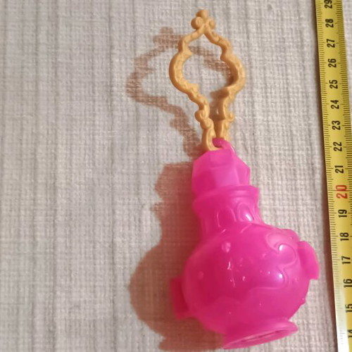 Mini doll in lantern like new, plastic