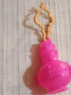 Mini doll in lantern like new, plastic