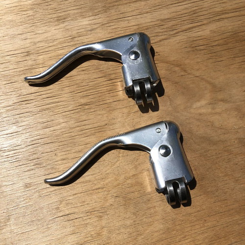 Vintage brake levers pair new old stock