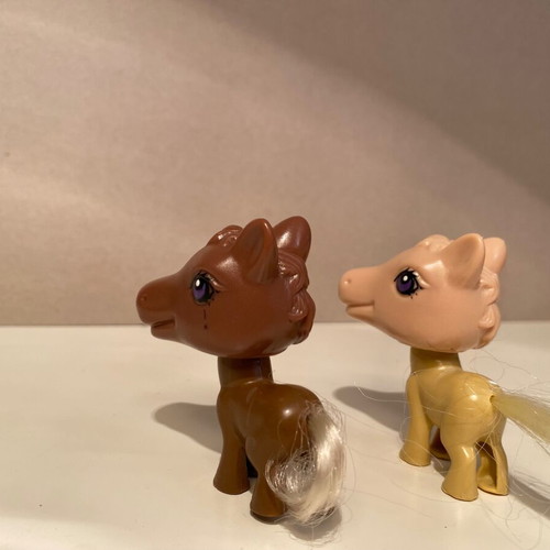 Set of small plastic pony figures like new