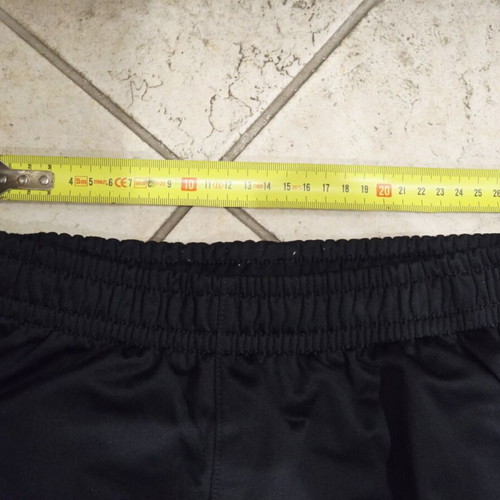 Nike kids' black tracksuit pants like new for ages 9-12