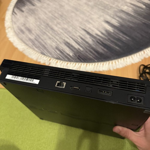 Sony PlayStation 3 Slim 320GB console used with 2 controllers and cables