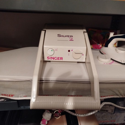 Singer Silver 2 Plus ironing board used with suction and heating