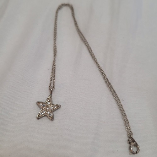 Star design necklace with rhinestones