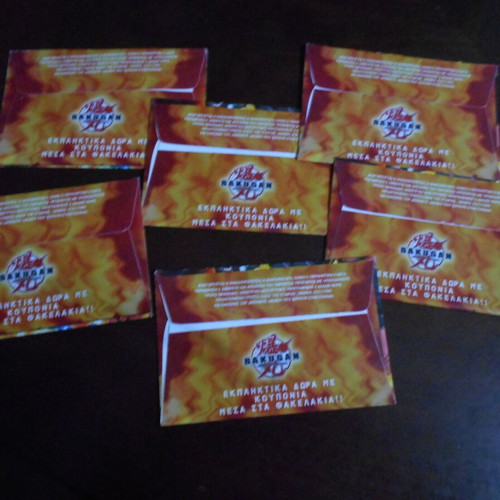 Bakugan used 6 sealed packs with cards