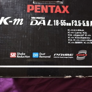ΦΩΤΟΓΡΑΦΙΚΗ ΜΙΧΑΝΗ  PENTAX K-m SMC DAL 18-55 mm (στο κουτί του+ τσάντα). ΣΕ ΑΡΙΣΤΗ ΚΑΤΑΣΤΑΣΗ.