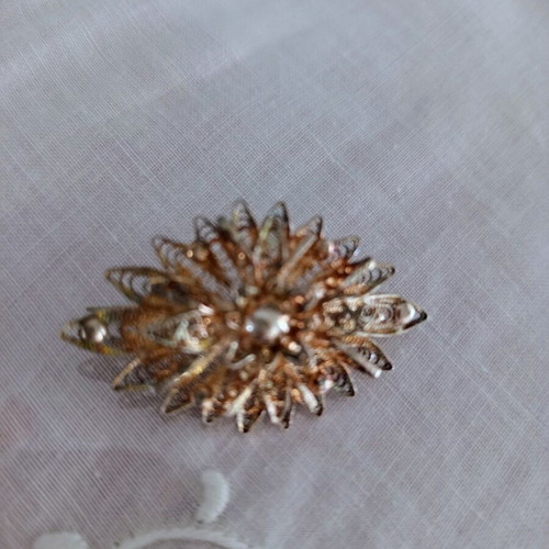 Vintage filigree sun brooch with pearls used