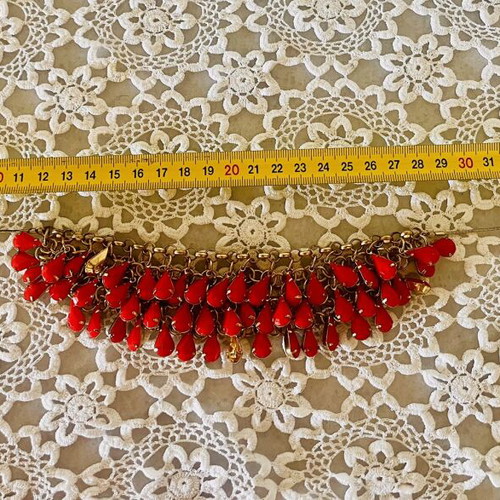 Statement necklace with fuchsia red drops and gold chain used