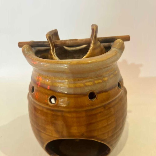 Ceramic Aroma Diffuser used, brown tone 11x9