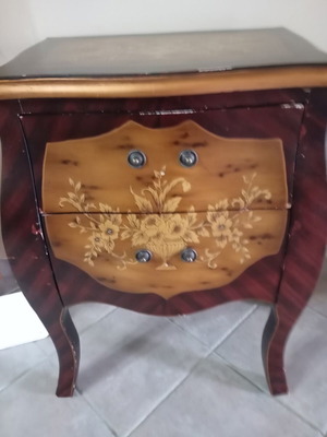 Antique dresser used with curved design and floral decoration