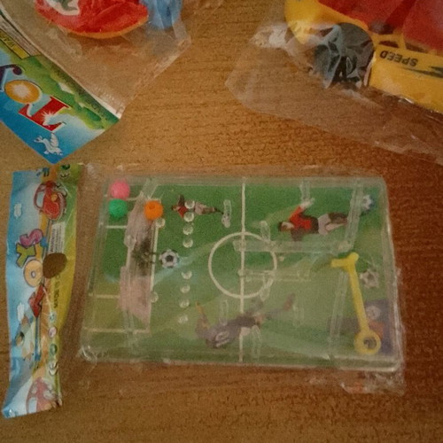 Various toys new, pack with 2 cars and tabletop football