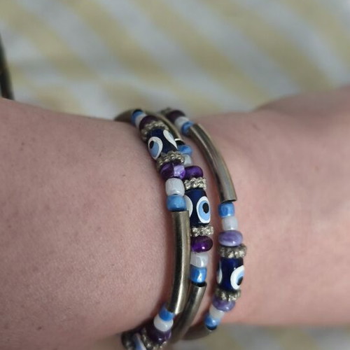 Spiral Bracelet with Evil Eye Beads like new, blue and purple