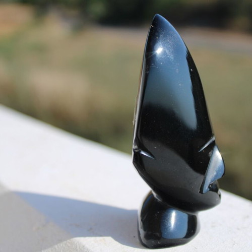 Obsidian African face sculpture