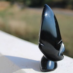 Obsidian African face sculpture