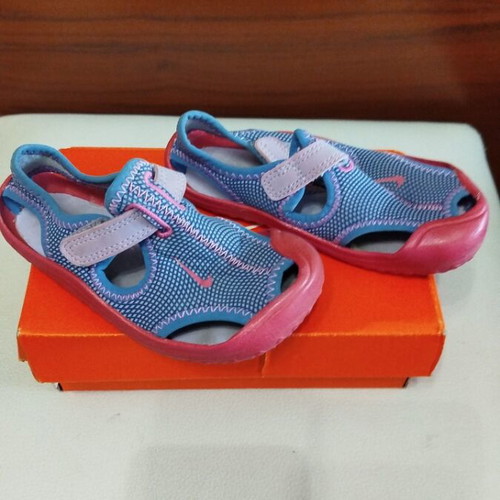 Nike kids sea shoes used size 23 pink and purple