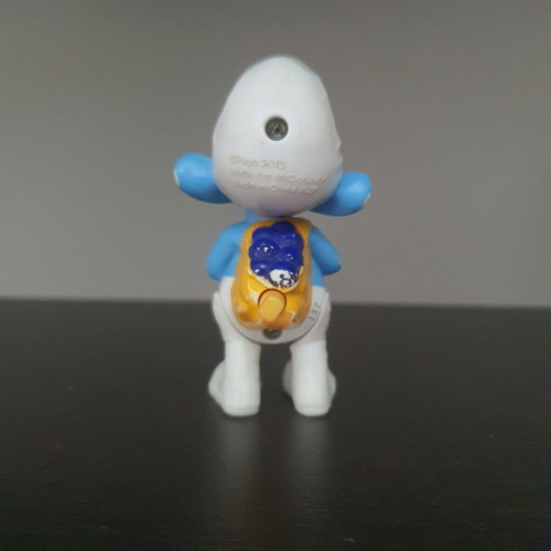Greedy Smurf figure used with functional mechanism