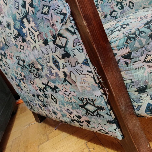 Armchair used made of good wood with fabric cover