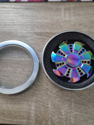 Burned titanium stress relief spinner