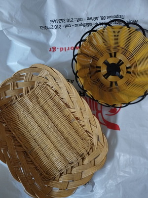 Baskets with gifts including wooden massage and sewing tools like new
