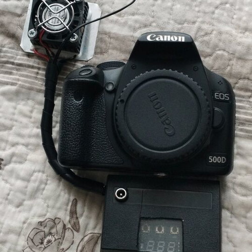 Canon EOS 500D DSLR camera used, modified for astrophotography with cooling