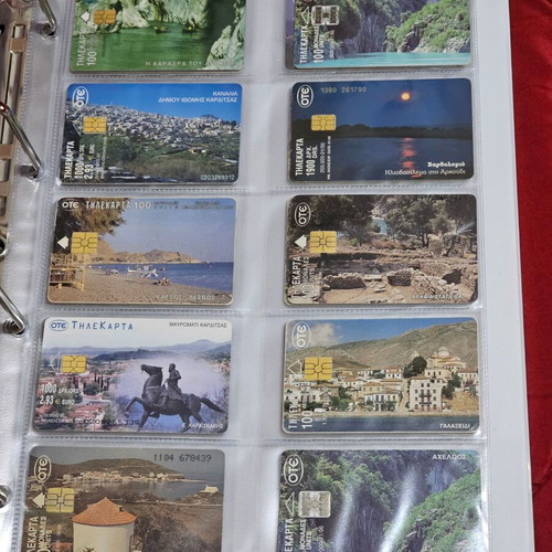 Phone cards used, album with 560 pieces