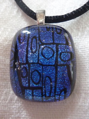 Pendant necklace made of dichroic glass like new, blue and black