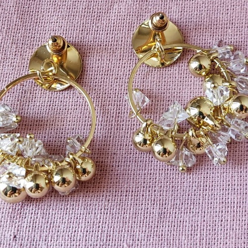 Metal hoop earrings with decorations like new, gold tone