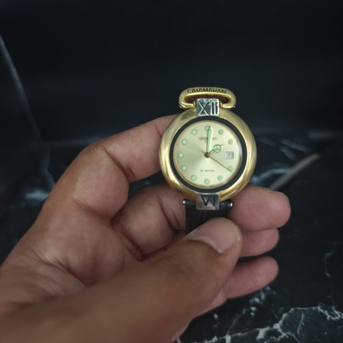 Catamaran Club Swiss Quartz watch used, vintage 1991, gold and silver