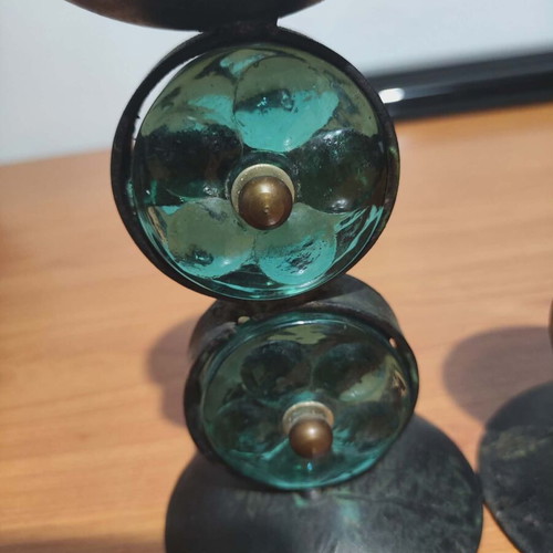 Old candle holders used, metal and glass
