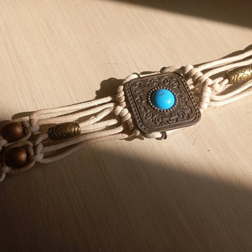 Adjustable belt used, missing one stone